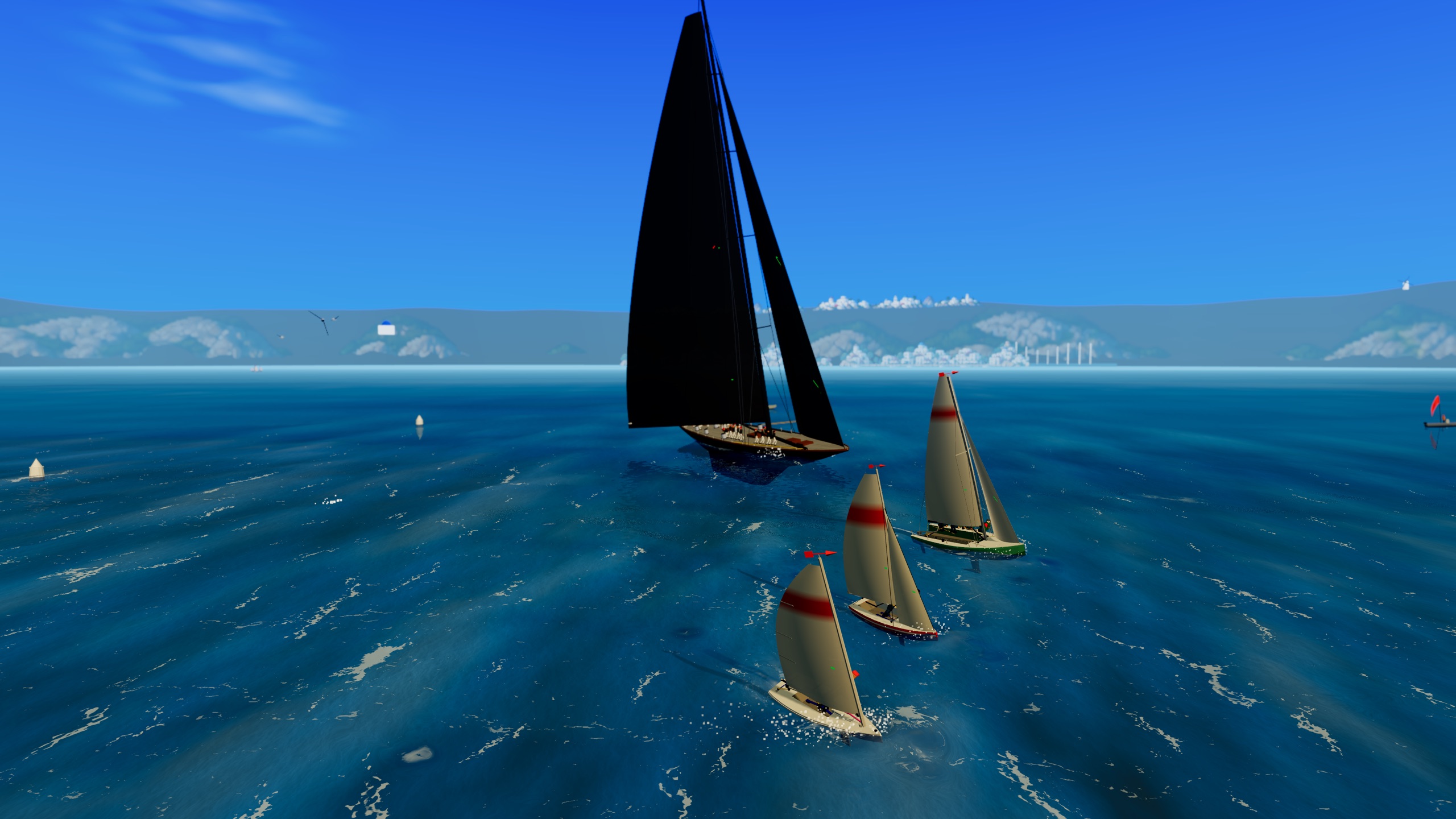 All four boats on one beat: the two dinghies, the keelboat and the big yacht behind