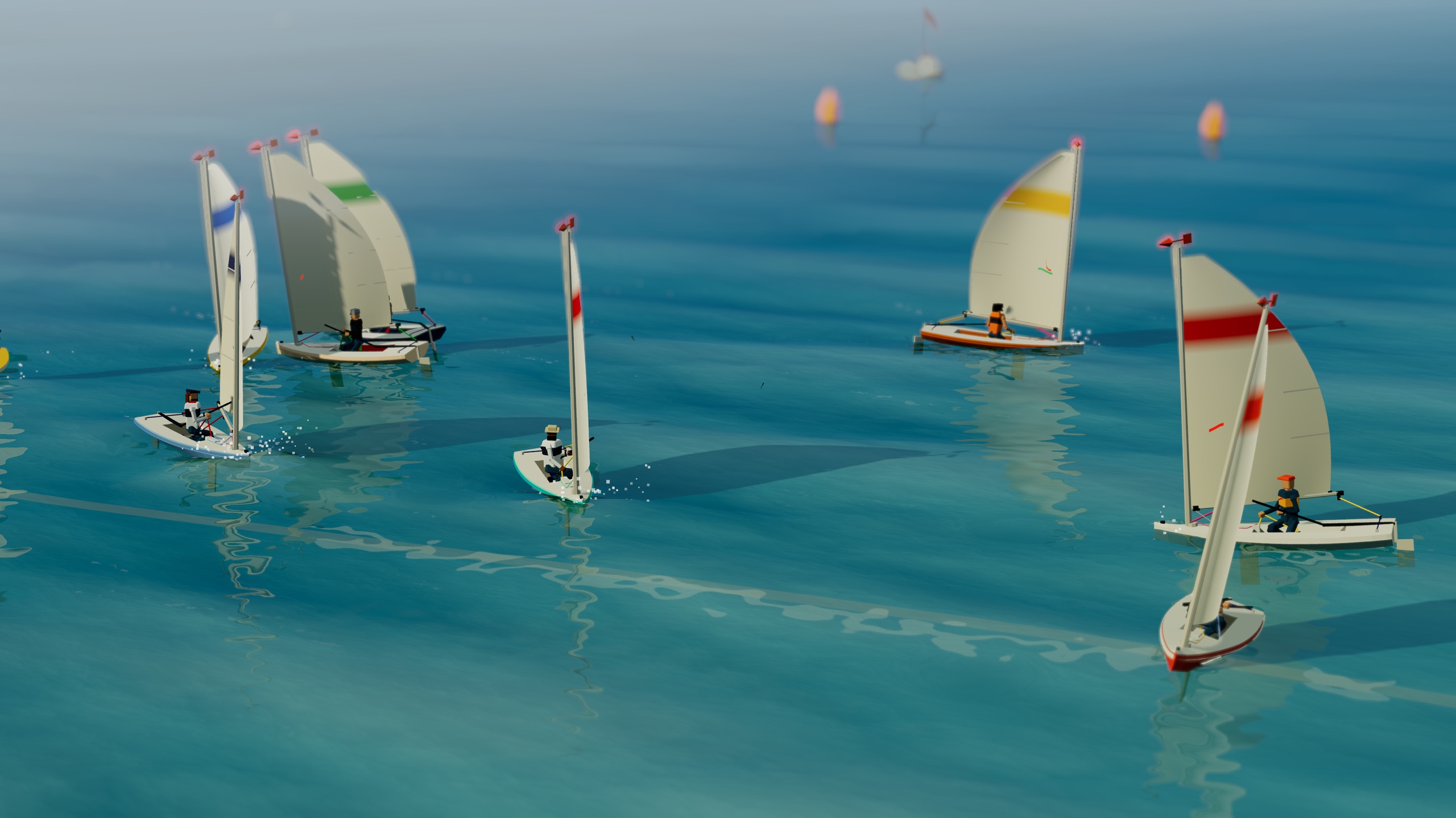 A dozen dinghies packed on the start line a moment before the gun