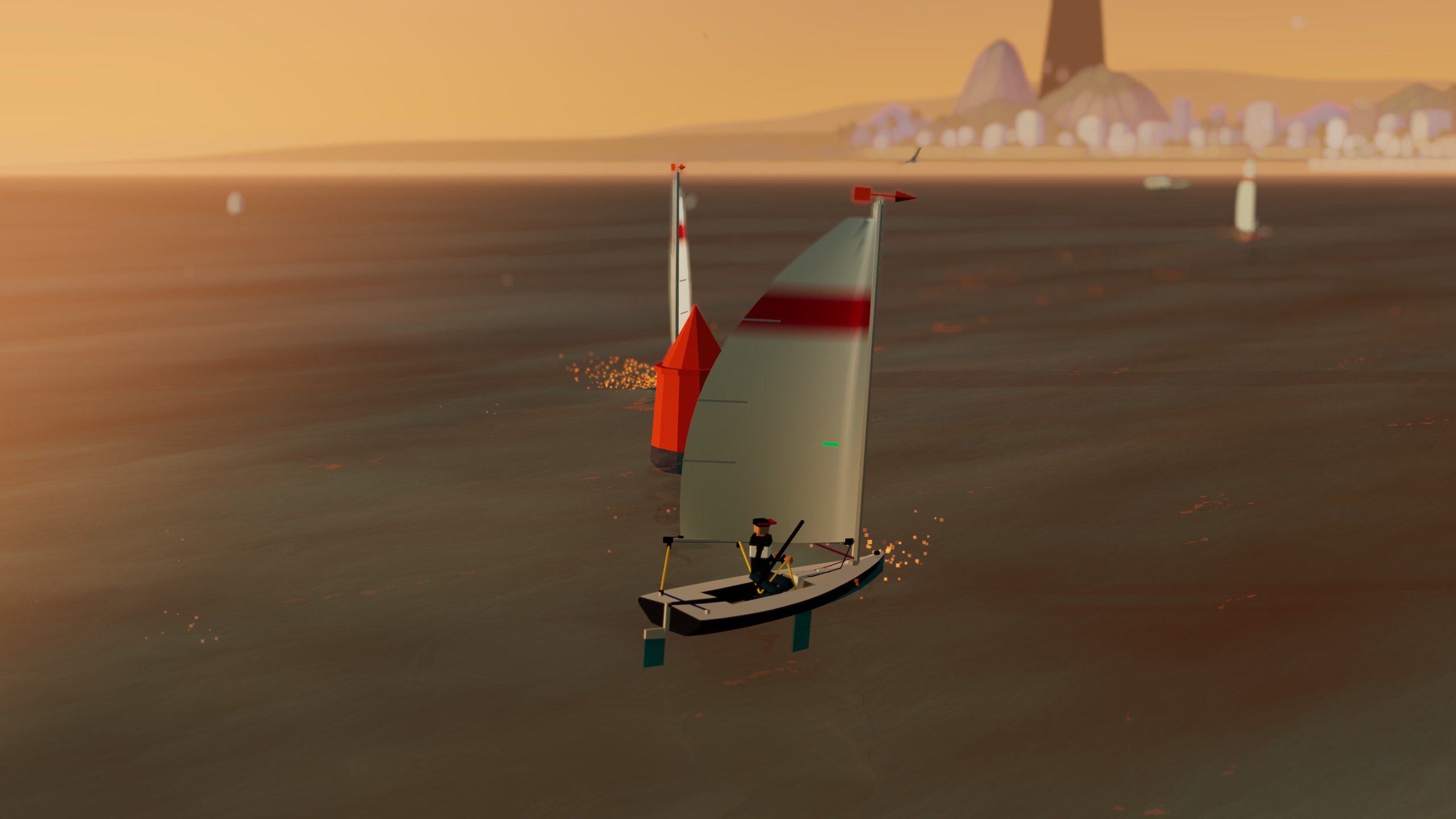 The fleet rounding the windward mark into the sunset off Rio